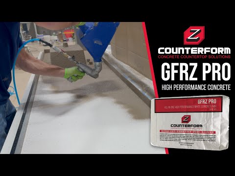 GFRZ Pro high-performance concrete being sprayed onto a surface, showcasing its application process for durable and smooth countertop finishes.